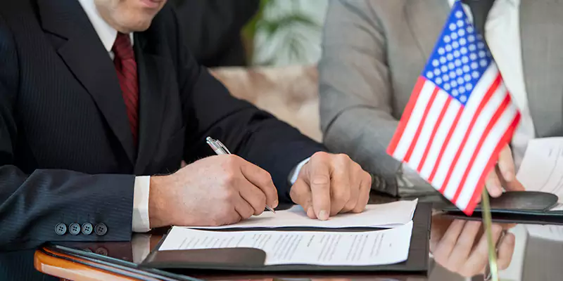 Why Choose Our E2 Visa Legal Services in Iraq?